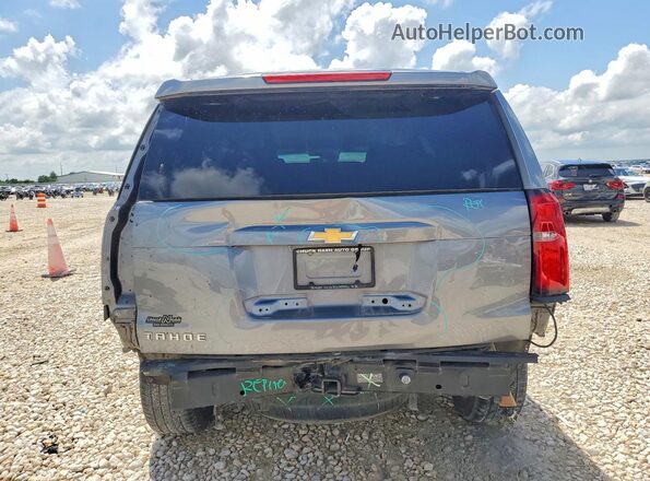 1GNSCBKC6KR106980 2019 CHEVROLET TAHOE Gray Вид ззаду