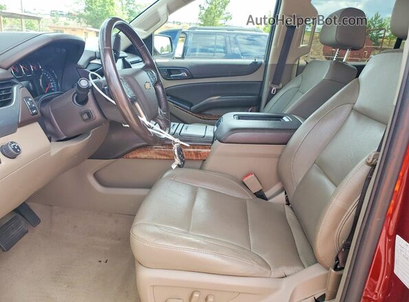 1GNSCCKC1LR248421 2020 CHEVROLET TAHOE Красный Вид салона спереди
