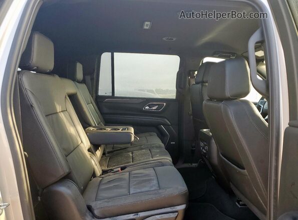 1GNSCCKD6PR327291 2023 CHEVROLET SUBURBAN Бежевый Вид задней части салона
