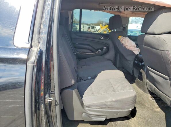 1GNSCGKC1HR306221 2017 CHEVROLET SUBURBAN Черный Вид задней части салона