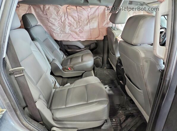 1GNSKBKC1LR118524 2020 CHEVROLET TAHOE Серый Вид задней части салона