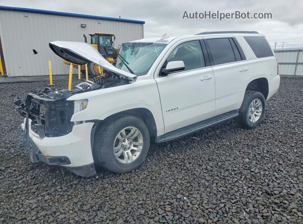 1GNSKBKC7LR119046 2020 CHEVROLET TAHOE Белый Передняя левая четверть