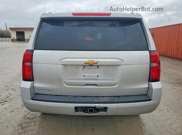 1GNSKBKC7LR121119 2020 CHEVROLET TAHOE Серебряный Вид сзади