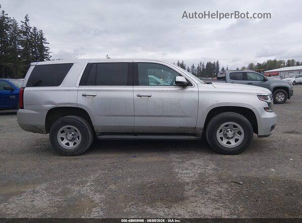 1GNSKFEC7LR127134 2020 CHEVROLET TAHOE Gray Widok wnętrza z tyłu