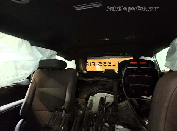 1GNSKLED6RR211915 2024 CHEVROLET TAHOE Black Widok tylnych siedzeń