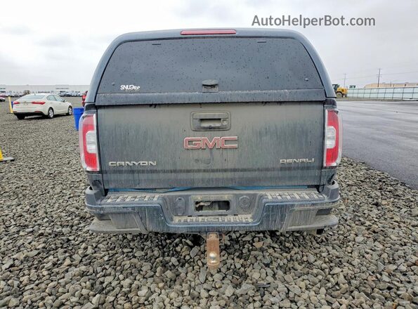 1GTP6EE12H1177568 2017 GMC CANYON Бирюзовый Вид сзади