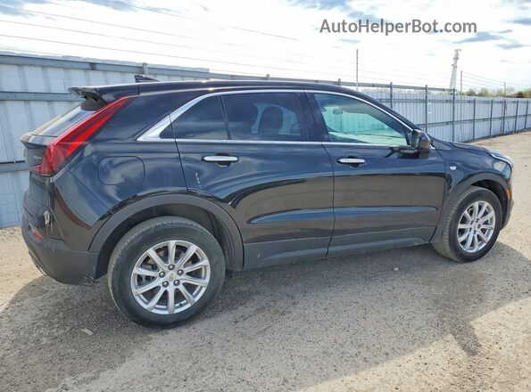 1GYFZBR41MF079709 2021 CADILLAC XT4 Black Trasero derecho