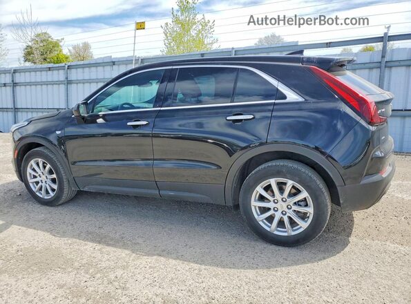 1GYFZBR41MF079709 2021 CADILLAC XT4 Black Trasero izquierdo
