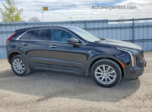 1GYFZBR41MF079709 2021 CADILLAC XT4 Black Delantero derecho