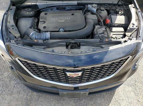 1GYFZBR41MF079709 2021 CADILLAC XT4 Black Vista del compartimento del motor