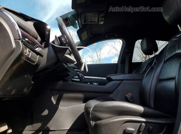 1GYFZBR41MF079709 2021 CADILLAC XT4 Black Vista interior delantera