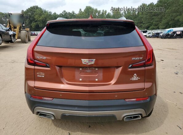 1GYFZDR40KF227728 2019 CADILLAC XT4 Orange Widok z tyłu