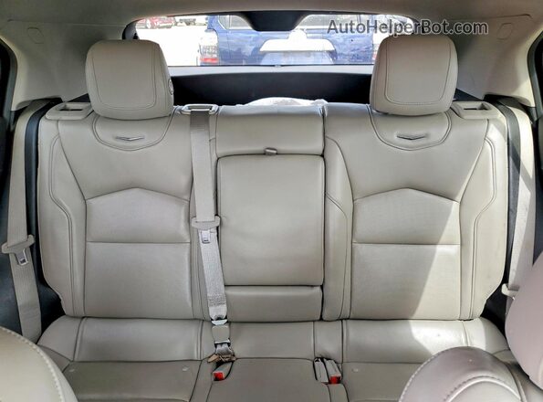 1GYFZDR41KF176434 2019 CADILLAC XT4 Burgundy Vista de los asientos traseros