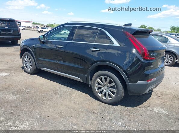 1GYFZDR41PF110912 2023 CADILLAC XT4 Черный Задняя левая четверть