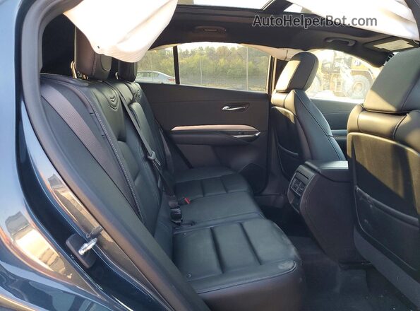 1GYFZDR43KF170845 2019 CADILLAC XT4 Угольный Вид задней части салона