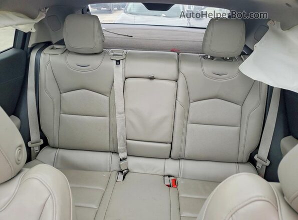 1GYFZDR45KF143128 2019 CADILLAC XT4 Red Widok tylnych siedzeń