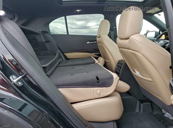 1GYFZDR46RF213794 2024 CADILLAC XT4 Черный Вид задней части салона