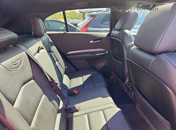 1GYFZDR46RF238520 2024 CADILLAC XT4 Белый Вид задней части салона