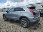 2024 Cadillac Xt4 Premium Luxury Silver vin: 1GYFZDR48RF133090 Damage: Left Front Door, Dent(S) W/ Paint Dmg, 1 To 2 Inches