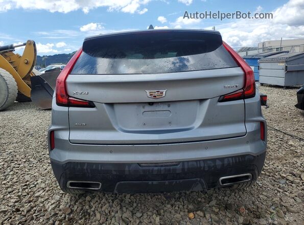 1GYFZDR48RF133090 2024 CADILLAC XT4 Silver Widok z tyłu