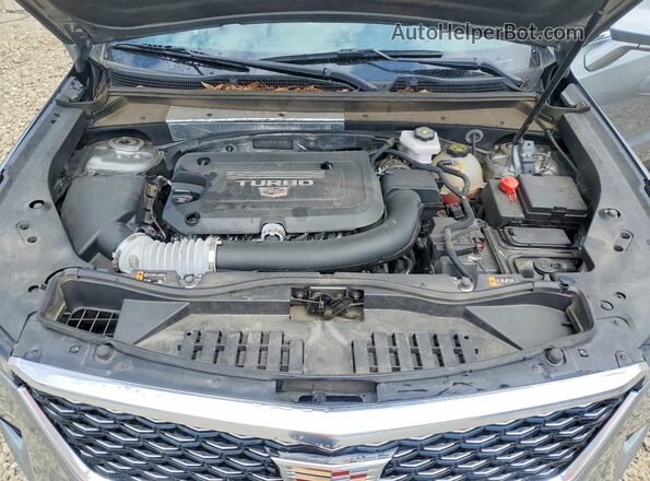 1GYFZDR48RF133090 2024 CADILLAC XT4 Silver Widok komory silnika