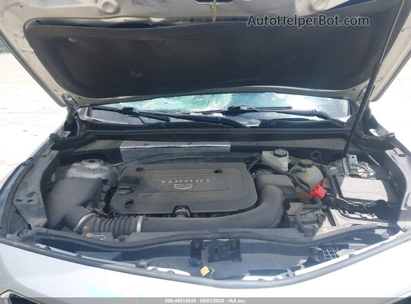 1GYFZFR4XMF054086 2021 CADILLAC XT4 Серебряный Вид сзади