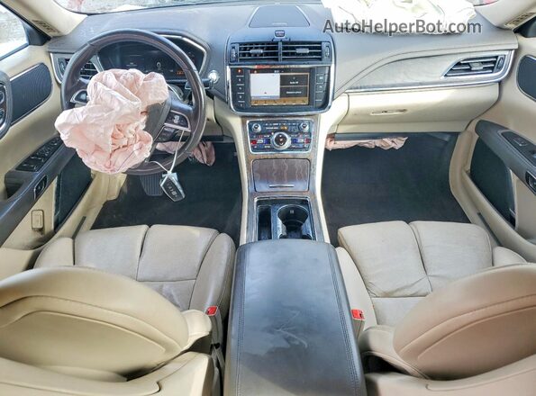 1LN6L9NP0H5623799 2017 LINCOLN CONTINENTA Темно-бордовый Вид панели приборов