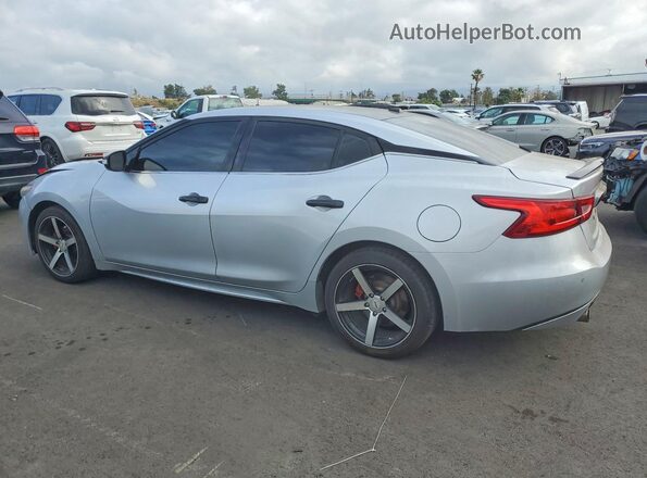 1N4AA6AP8JC385362 2018 NISSAN MAXIMA Silver Trasero izquierdo