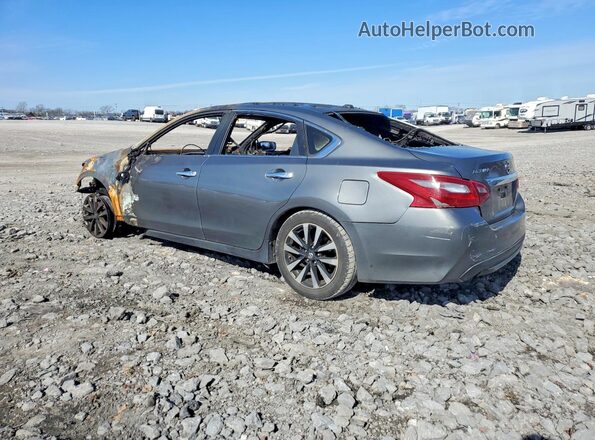 1N4AL3AP4JC105591 2018 NISSAN ALTIMA Silver Trasero izquierdo