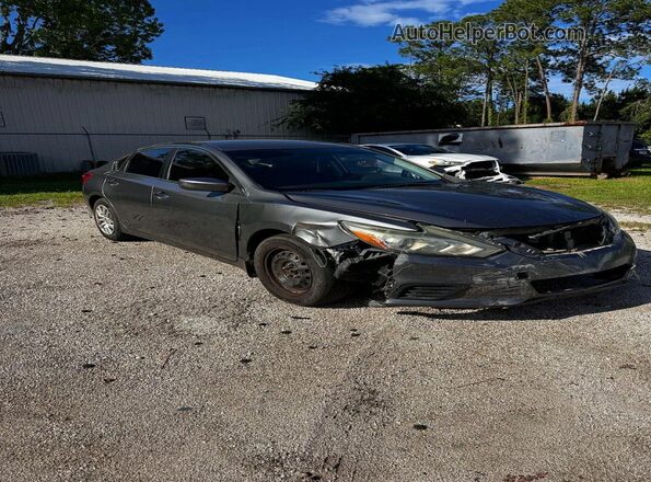 1N4AL3AP7GC186935 2016 NISSAN ALTIMA Gray Vista tres cuartos delantera izquierda
