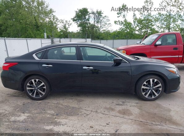 1N4AL3APXGC186718 2016 NISSAN ALTIMA Black Widok wnętrza z tyłu