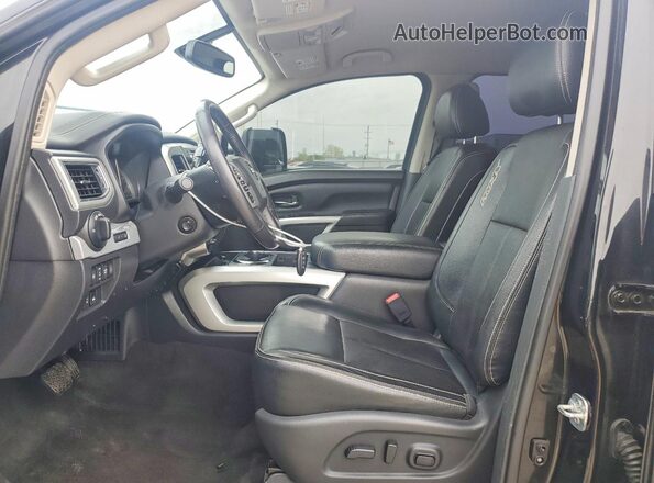 1N6BA1F41KN521074 2019 NISSAN TITAN Black Front interior view