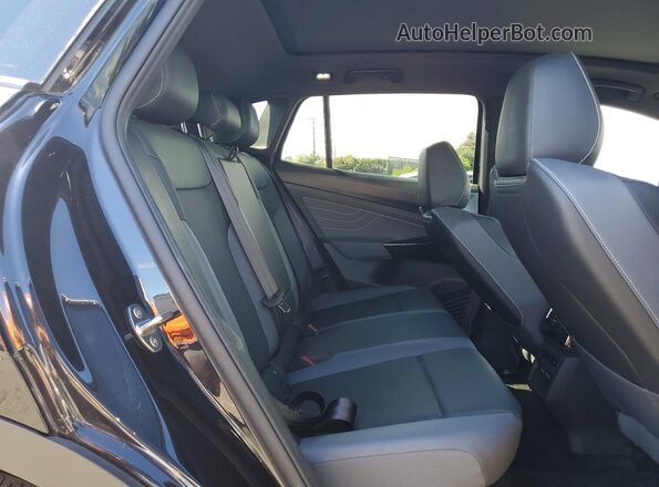 1V2HMPE84PC058604 2023 VOLKSWAGEN ID.4 Черный Вид задней части салона