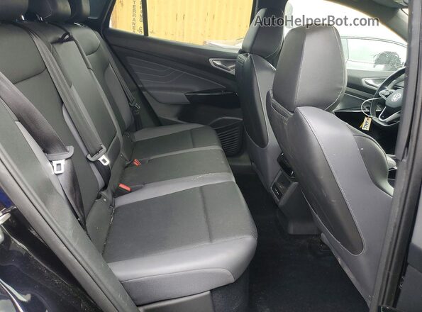 1V2WNPE84PC052371 2023 VOLKSWAGEN ID.4 Black Vista de los asientos traseros