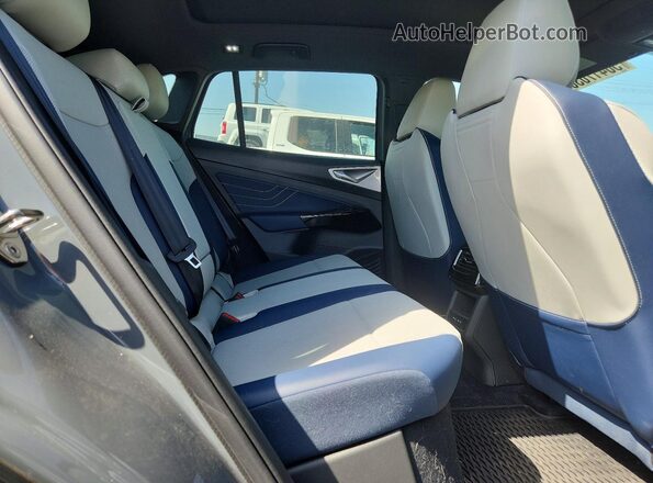 1V2WSPE84SC009974 2025 VOLKSWAGEN ID.4 Серый Вид задней части салона