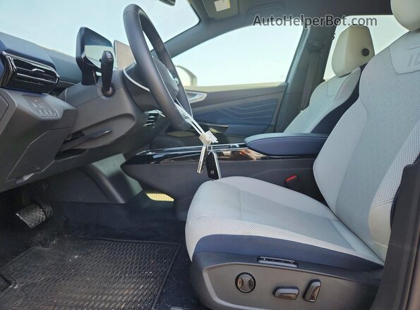 1V2WSPE84SC009974 2025 VOLKSWAGEN ID.4 Серый Вид салона спереди