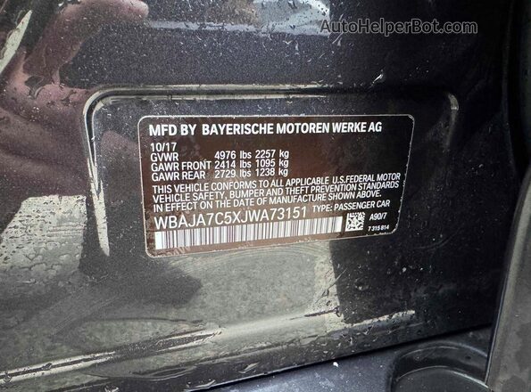 WBAJA7C5XJWA73151 2018 BMW OTHER Серый Вид задней части салона