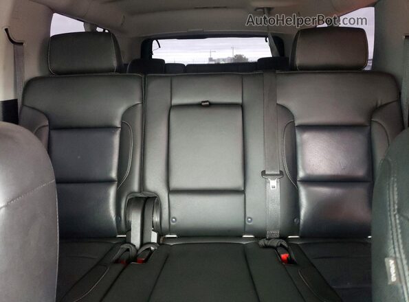 1GNSKHKC8JR208821 2018 CHEVROLET SUBURBAN Черный Вид задней части салона