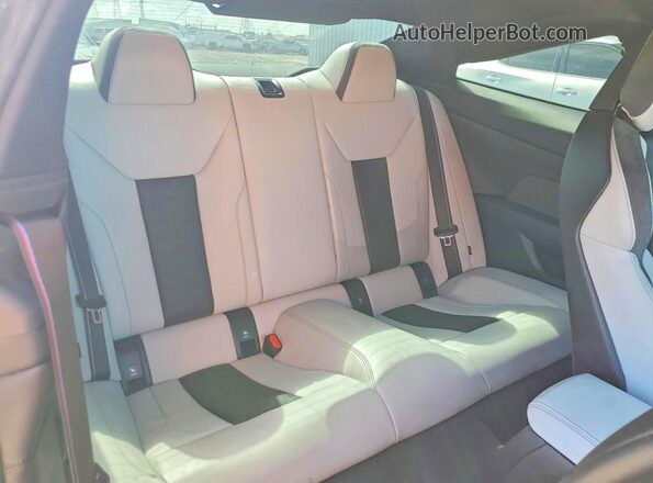 WBS43AZ05RCR90147 2024 BMW M4 Синий Вид задней части салона