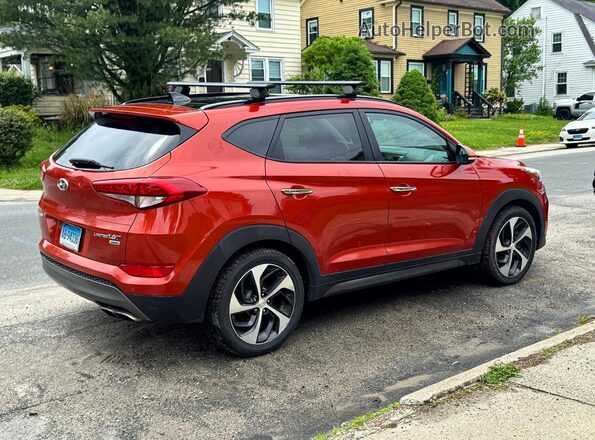 KM8J3CA26GU094705 2016 HYUNDAI TUCSON Burgundy Vista frontal