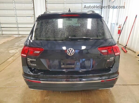 3VV2B7AX8JM145004 2018 VOLKSWAGEN TIGUAN Black Widok wnętrza z przodu