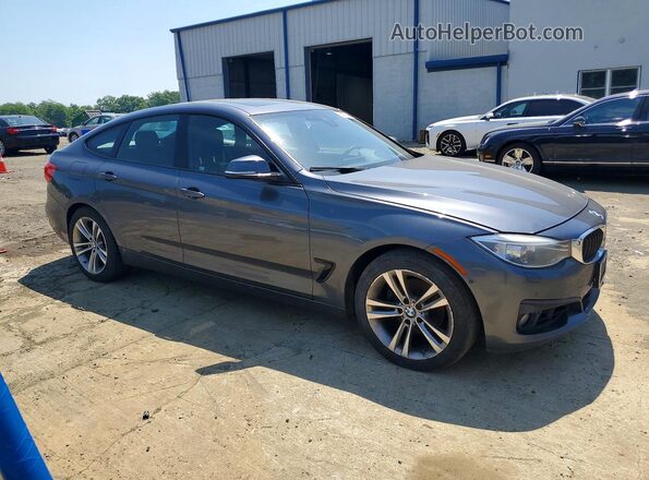 WBA8Z5C52GG502035 2016 BMW OTHER Gray Widok z przodu