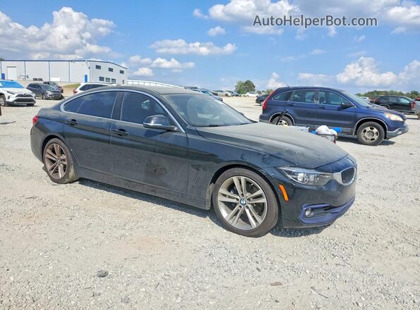 WBA4J1C58KBM12960 2019 BMW OTHER Черный Вид спереди
