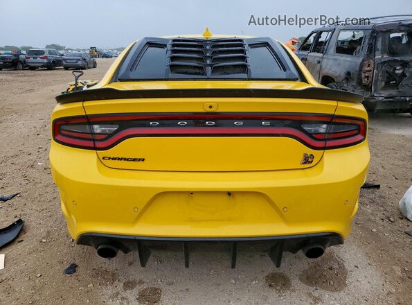 2C3CDXGJ1HH634485 2017 DODGE CHARGER Желтый Вид сзади