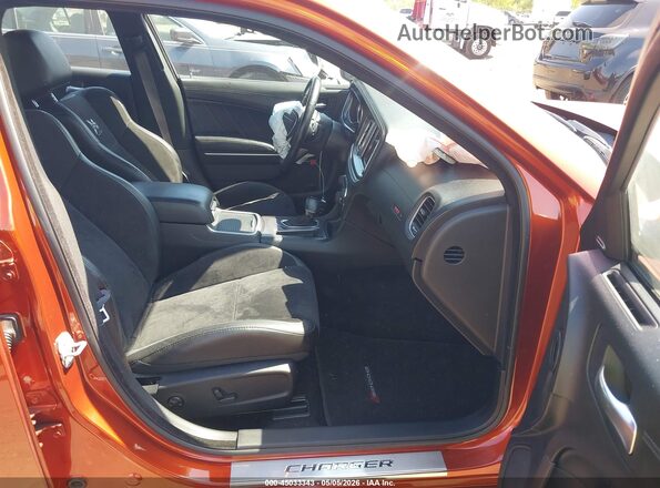 2C3CDXGJ4MH586149 2021 DODGE CHARGER Оранжевый Вид салона спереди