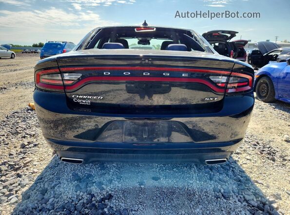 2C3CDXHG5JH328656 2018 DODGE CHARGER Черный Вид сзади