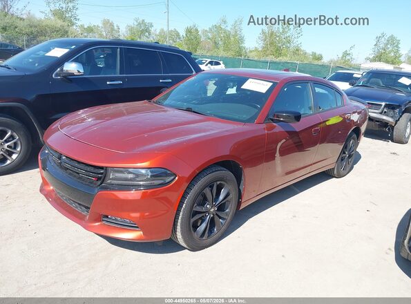 2C3CDXJG0LH205182 2020 DODGE CHARGER Оранжевый Передняя левая четверть
