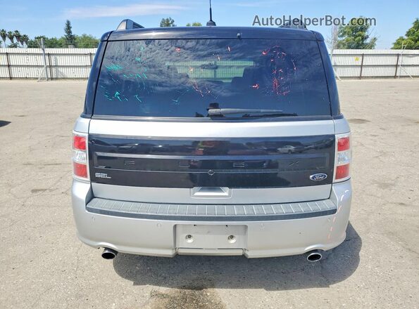 2FMGK5C8XKBA39277 2019 FORD FLEX Silver Rear view