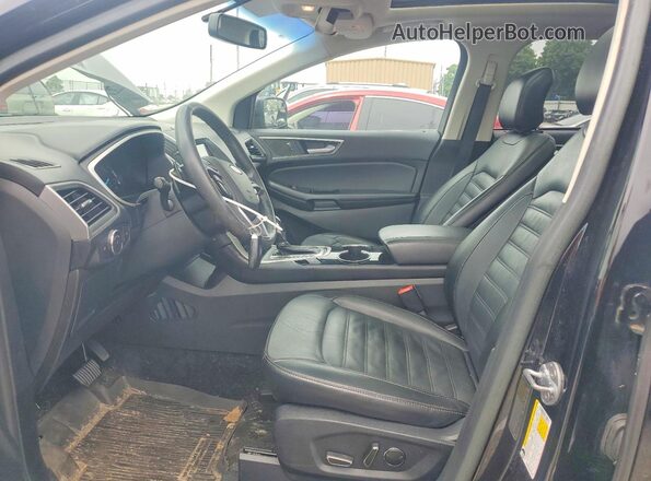 2FMPK3J90JBB18827 2018 FORD EDGE Черный Вид салона спереди