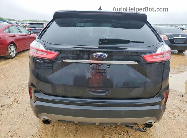 2FMPK3J90KBC47331 2019 FORD EDGE Черный Вид сзади